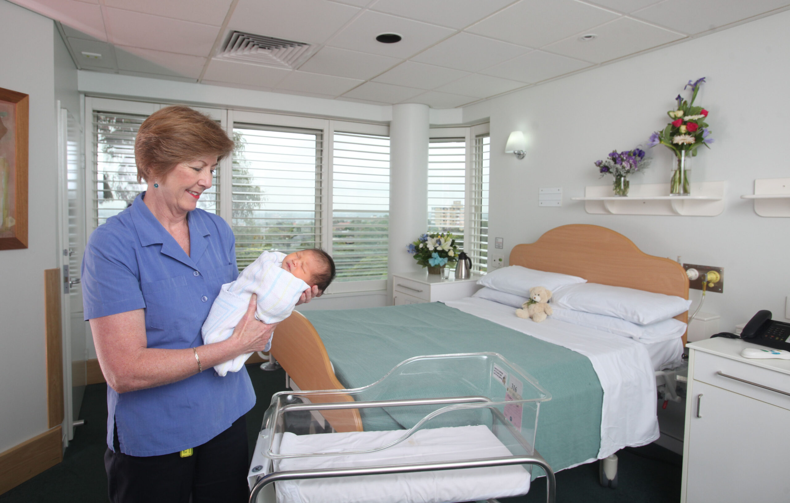 Delivery suites hospital labor suite center medical lexington bed newborn homelike touches inside windows tv crib lexmed